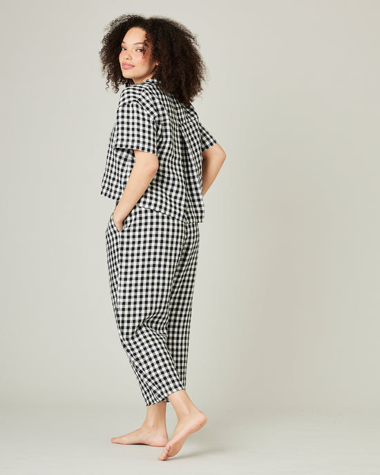 model wears black and white gingham linen pj top 