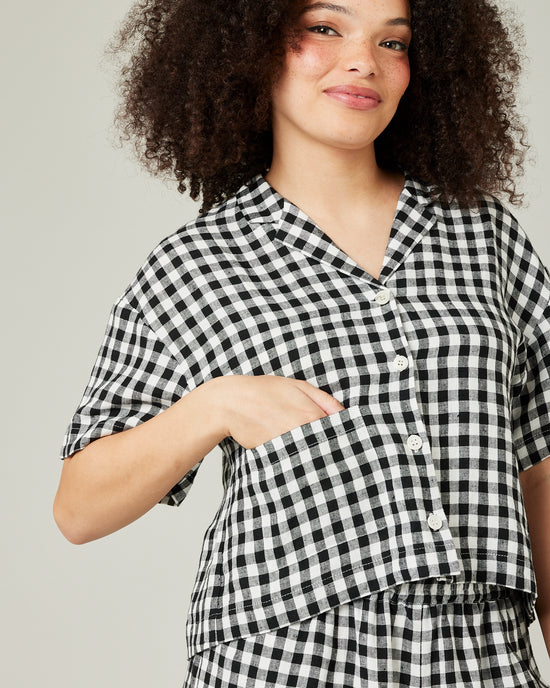 model wears black and white gingham linen pj top 