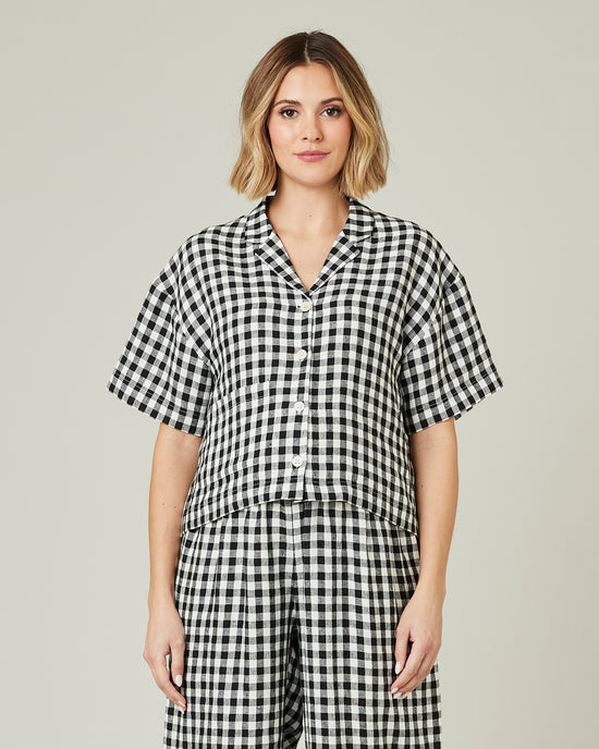 pregnant model wears black and white gingham linen pj top 