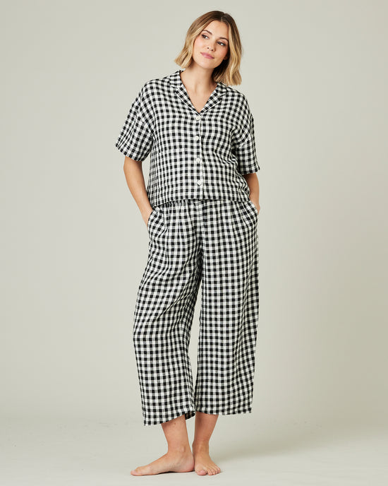 pregnant model wears black and white gingham linen pj top 