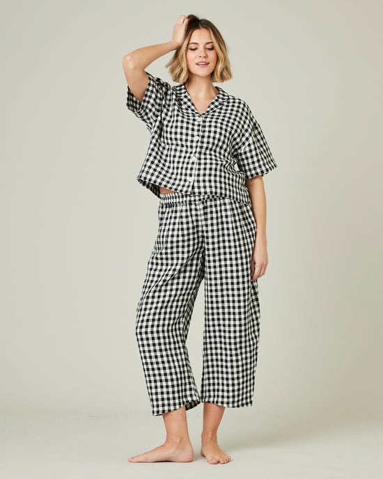 pregnant model wears black and white gingham linen pj top 