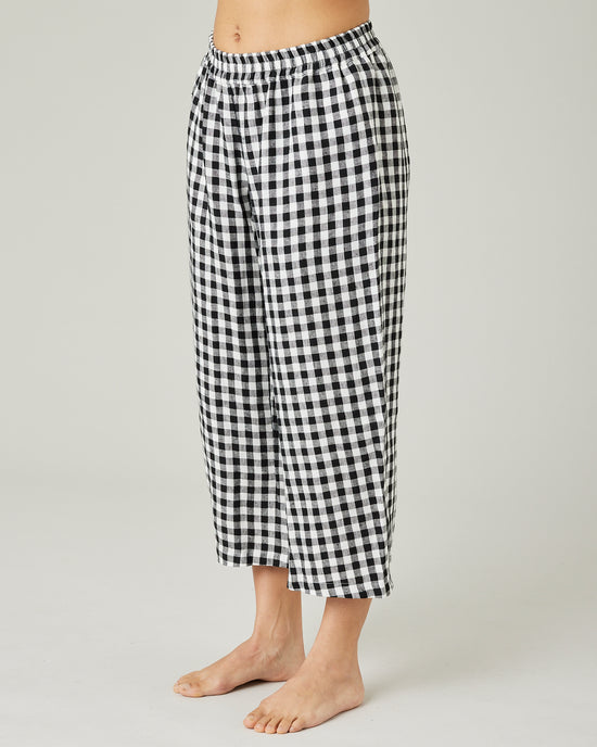 model wears black and white gingham ultimate pj linen trousers