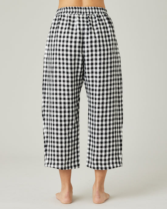 model wears black and white gingham ultimate pj linen trousers