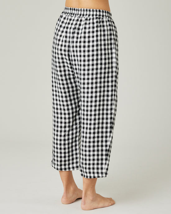 model wears black and white gingham ultimate pj linen trousers