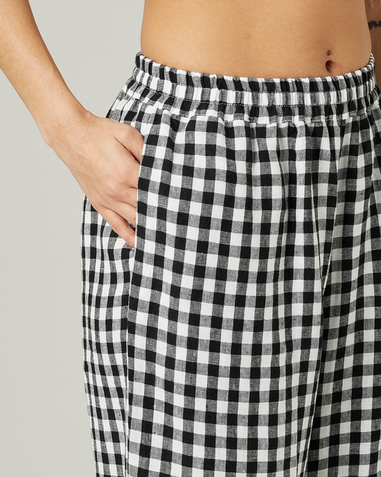 model wears black and white gingham ultimate pj linen trousers