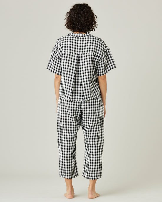 model wears black and white gingham ultimate pj linen trousers