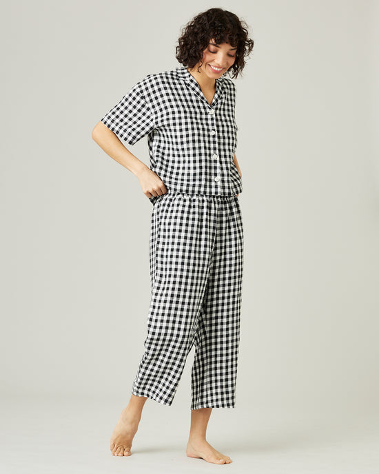 model wears black and white gingham ultimate pj linen trousers