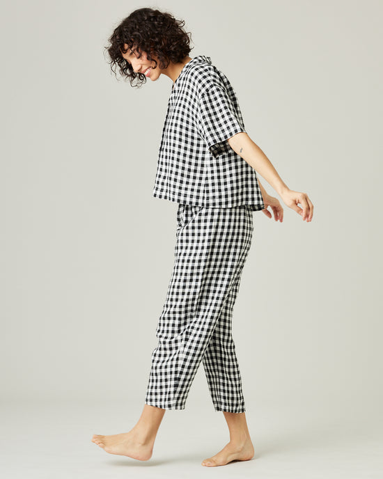 model wears black and white gingham ultimate pj linen trousers