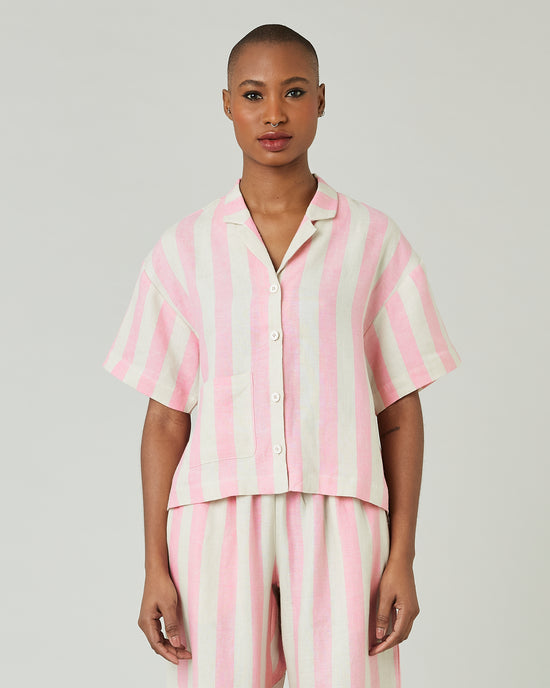 model wears pink and ecru stripe ultimate pj top 