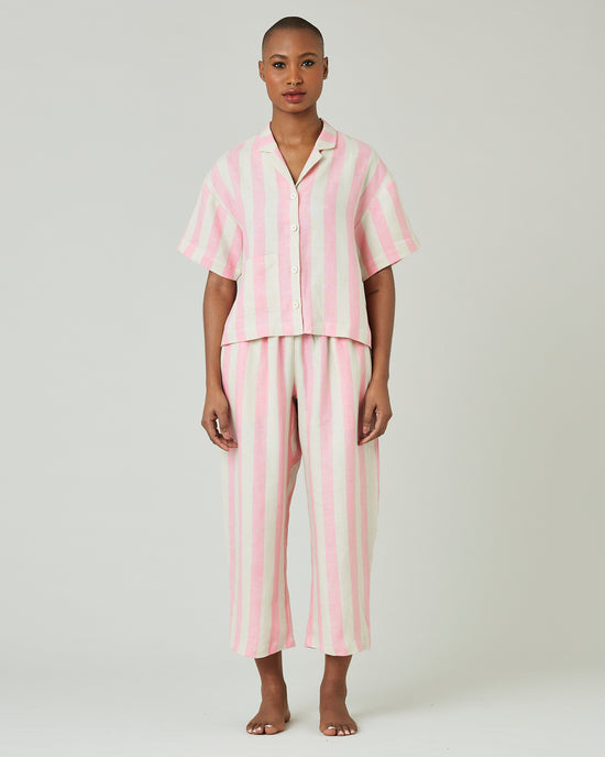 model wears pink and ecru stripe ultimate pj top 