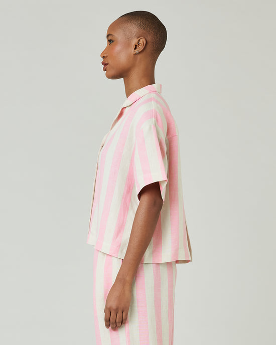 model wears pink and ecru stripe ultimate pj top 