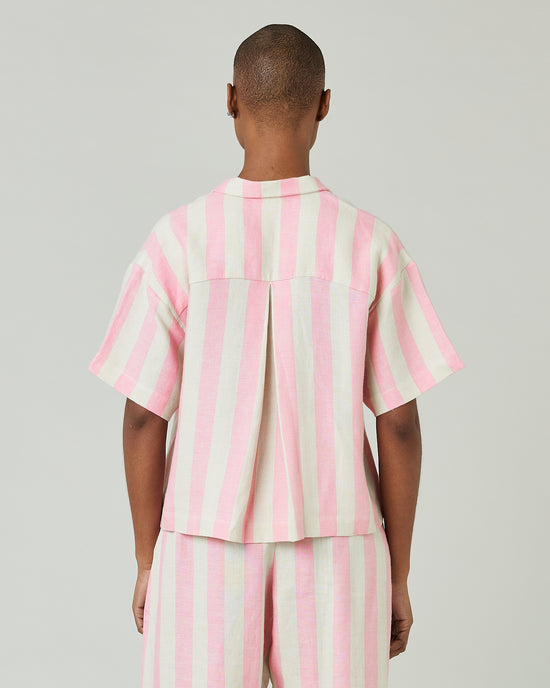 model wears pink and ecru stripe ultimate pj top 