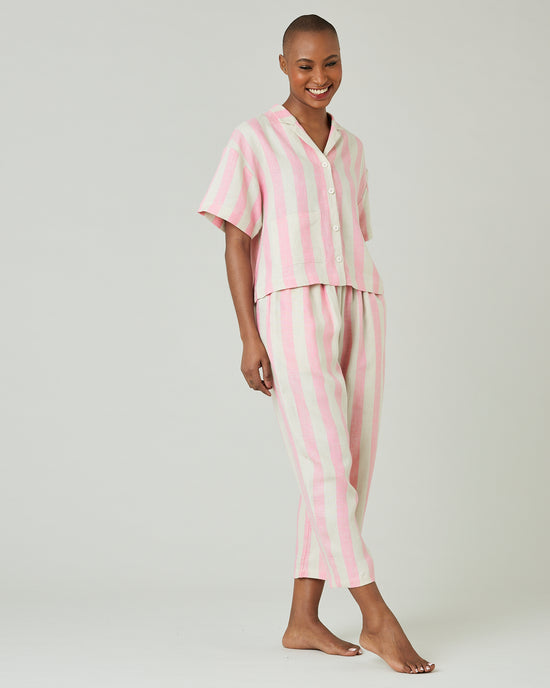 model wears pink and ecru stripe ultimate pj top 