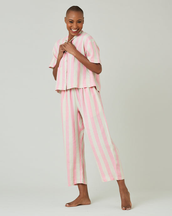 model wears pink and ecru stripe ultimate pj top 