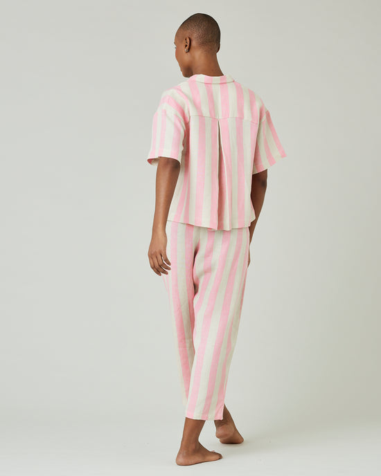 model wears pink and ecru stripe ultimate pj top 