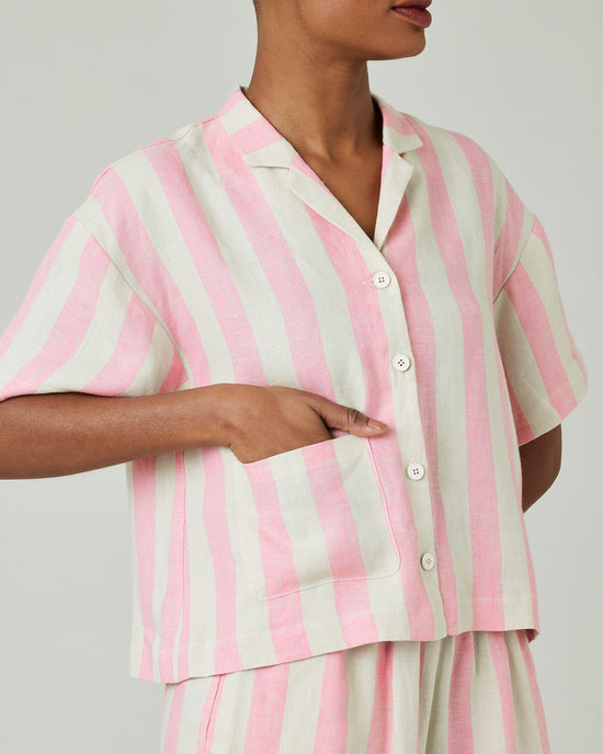 model wears pink and ecru stripe ultimate pj top 