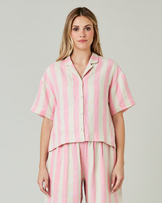 pregnant model wears pink and ecru stripe ultimate pj top 