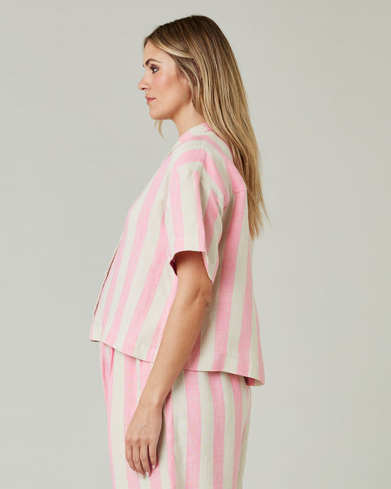 pregnant model wears pink and ecru stripe ultimate pj top 