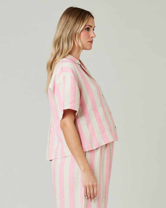 pregnant model wears pink and ecru stripe ultimate pj top 