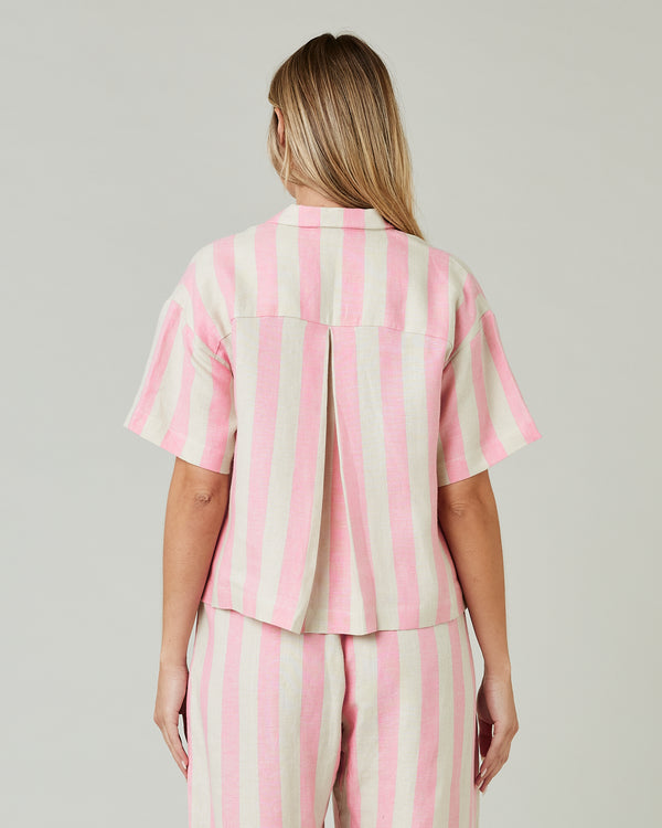 pregnant model wears pink and ecru stripe ultimate pj top 