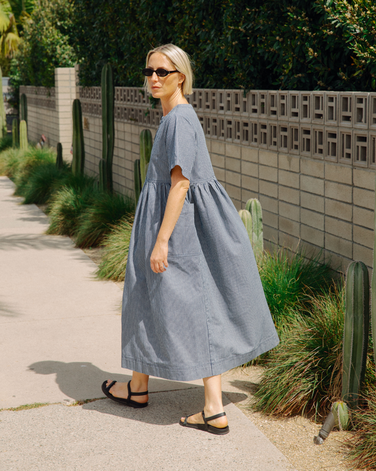 model wears kera navy hickory stripe denim dress