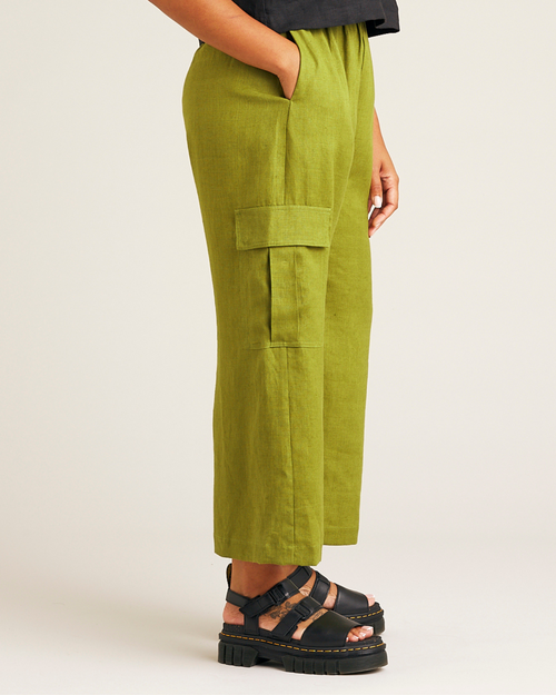 model wears pea pod linen trousers right