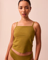 model wears golden olive jersey vest top