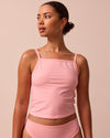 model wears petal pink jersey vest top
