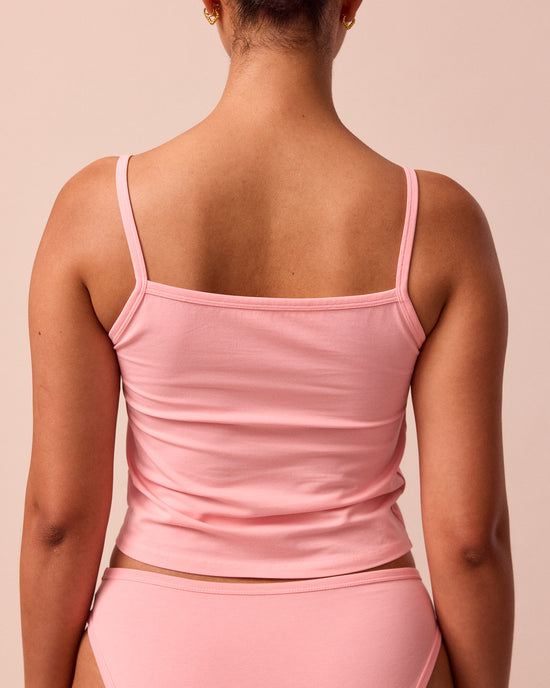 model wears petal pink jersey vest top