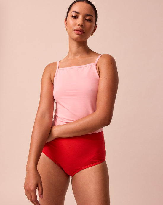 model wears petal pink jersey vest top