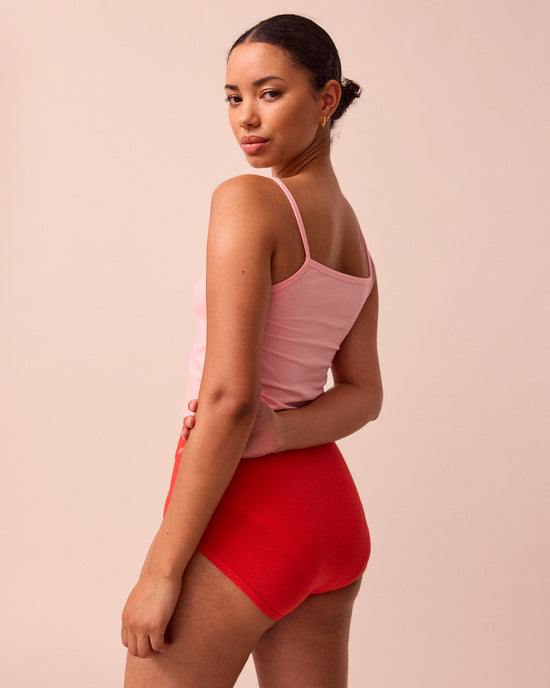 model wears petal pink jersey vest top