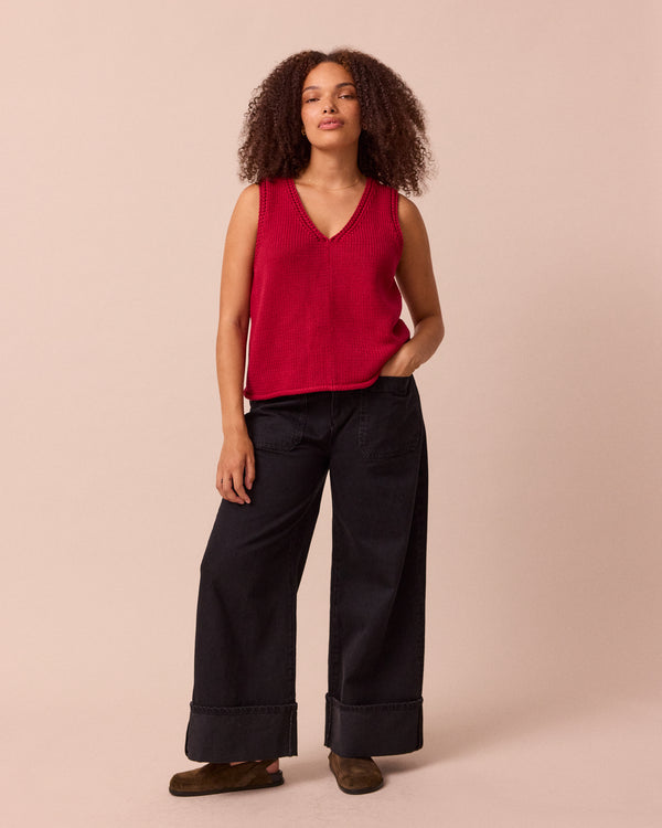 model wears vita cranberry knitted vest