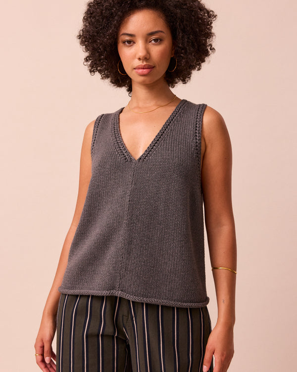 model wears vita fog knitted vest