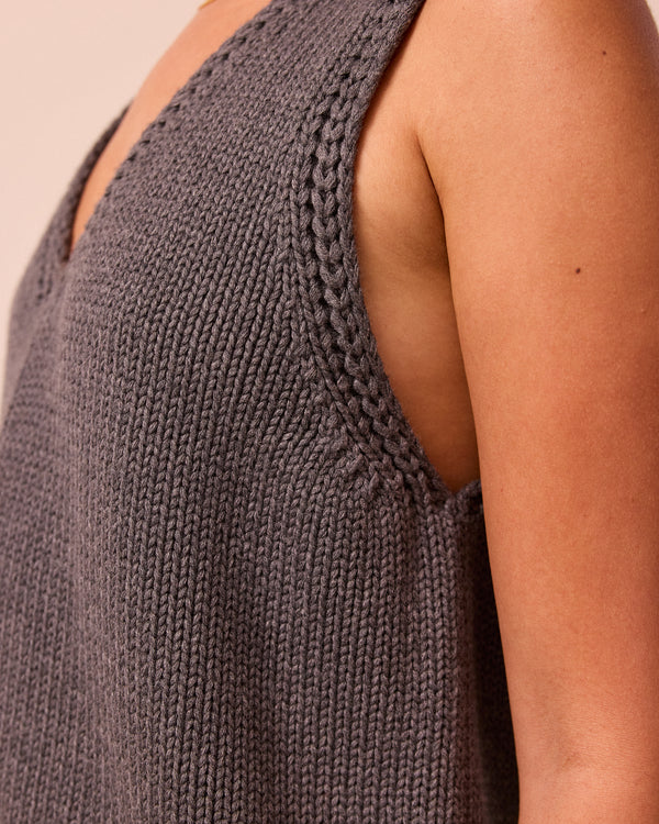 model wears vita fog knitted vest