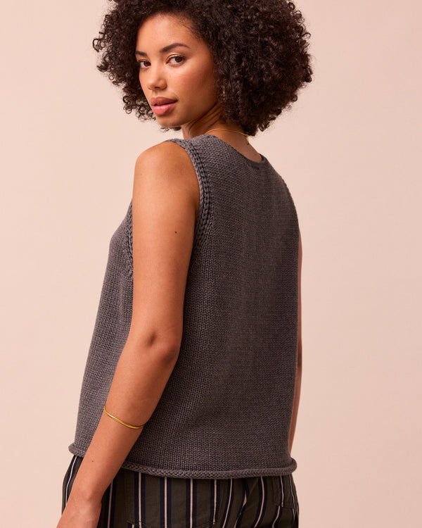 model wears vita fog knitted vest