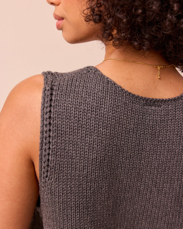 model wears vita fog knitted vest