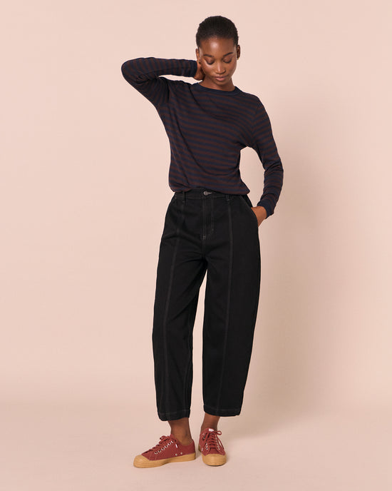 model wears vivi black denim jeans
