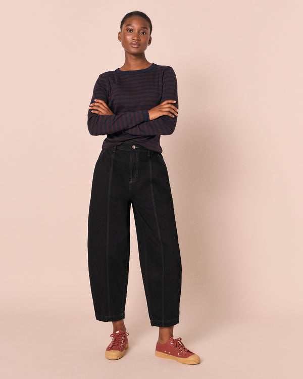 model wears vivi black denim jeans