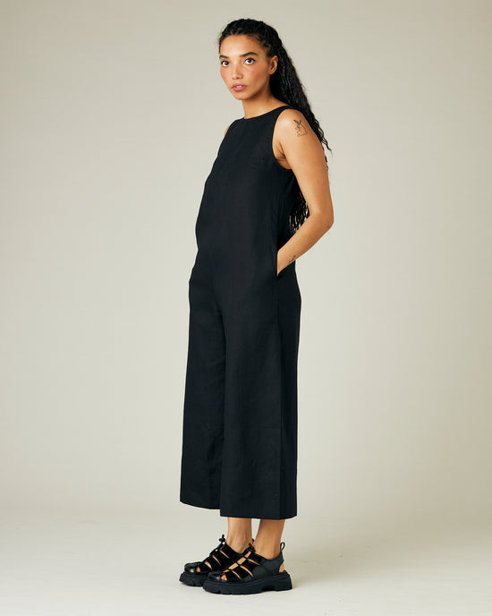 model wears black linen vivienne jumpsuit