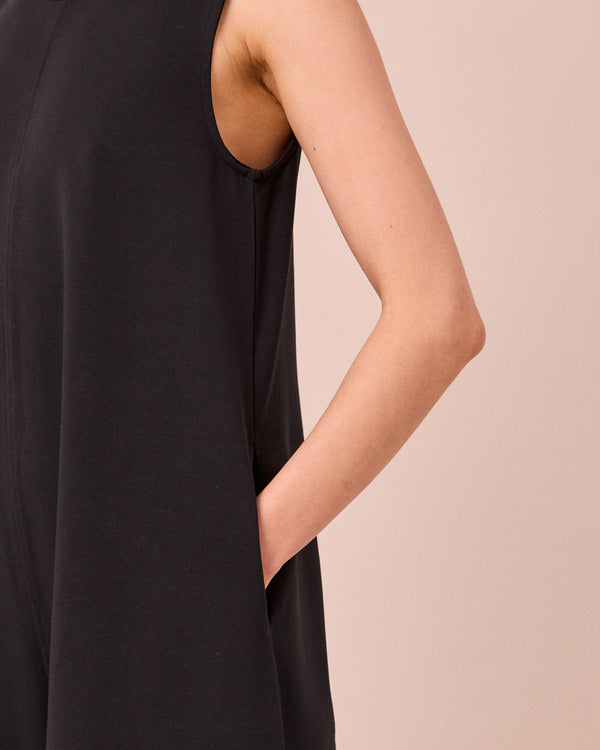 model wears vivienne black jersey jumpsuit