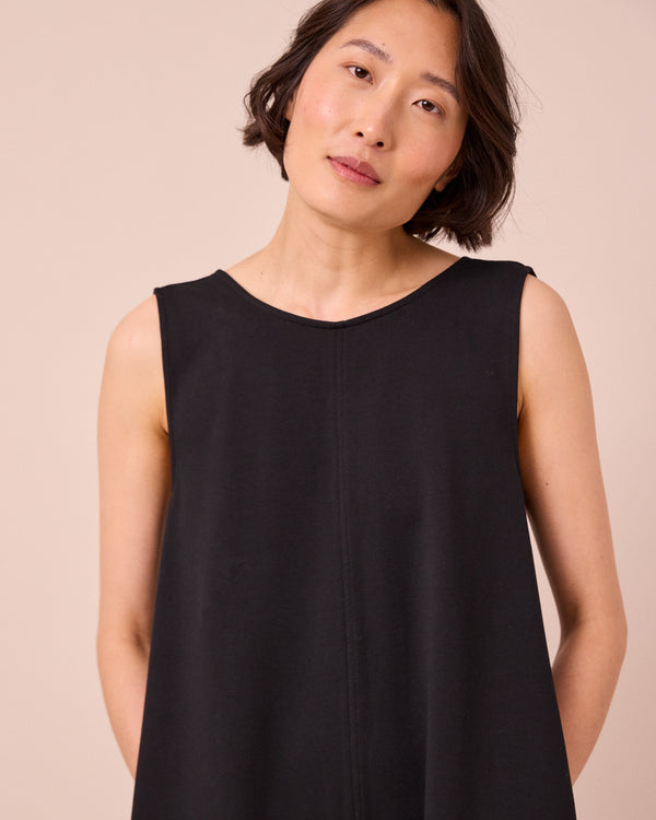 model wears vivienne black jersey jumpsuit