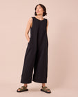 model wears vivienne black jersey jumpsuit
