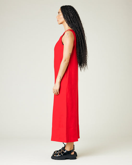 model wears red linen vivienne jumpsuit