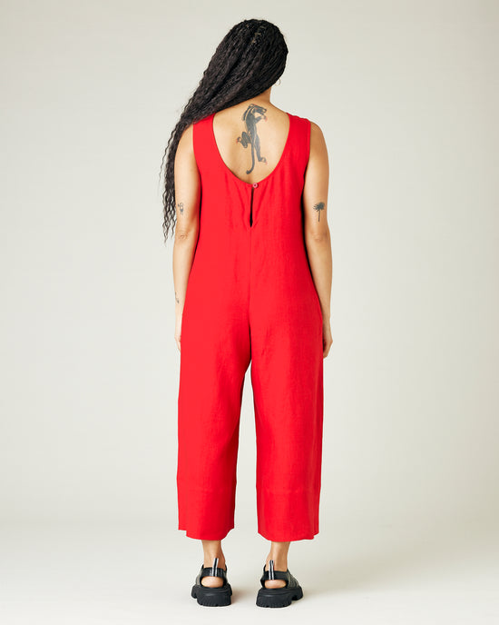 model wears red linen vivienne jumpsuit