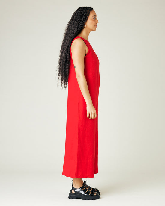 model wears red linen vivienne jumpsuit