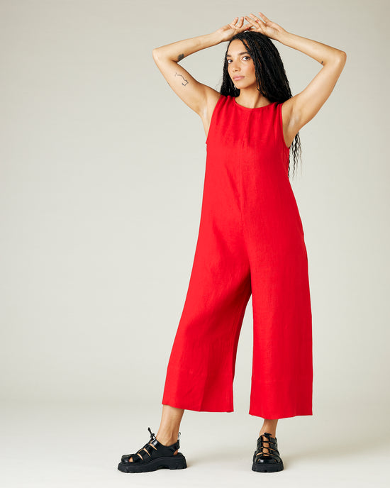 model wears red linen vivienne jumpsuit