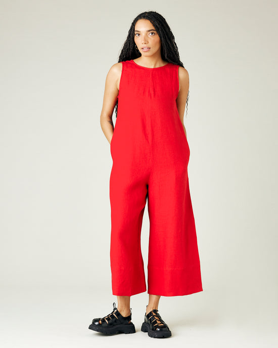 model wears red linen vivienne jumpsuit