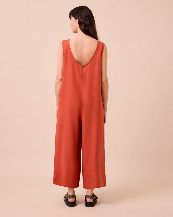 model wears vivienne burnt orange linen jumpsuit