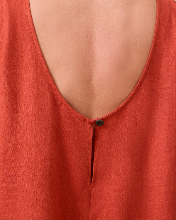 model wears vivienne burnt orange linen jumpsuit