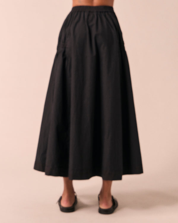 model wears willow black poplin skirt